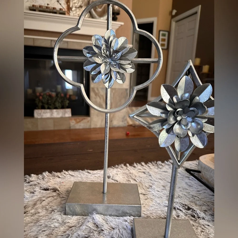 Home decor accents  two silver flowers on pedestal stand